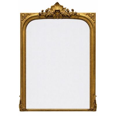 a gold framed mirror on a white wall with a white background