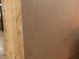 a large piece of cardboard sitting on a pallet in a room
