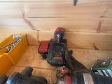 many tools that are sitting on the floor in the room