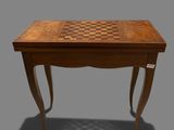 une image représentant une table en bois sur laquelle est posé un échiquier