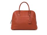 an image of a brown leather handbag on a white background