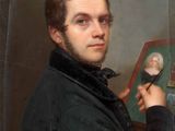 portrait of a man in a black coat holding a brush and a mirror