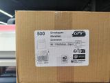 a cardboard box that has a sticker on it