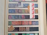 a picture of a picture of a book with stamps on it