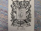 an image of a book with a coat of arms on top of it