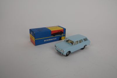 une image représentant une petite voiture et une boîte posées sur une table