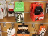 many different items on the wall in this store