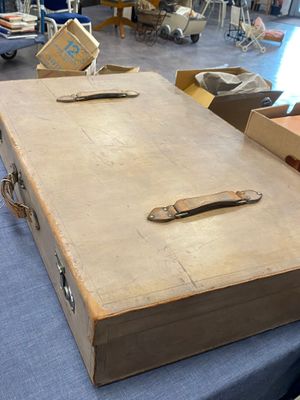 a suitcase that is sitting on a table in a room