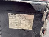 a black box with a chain attached to it