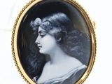 portrait of a woman in a black and white dress with a flower in her hair