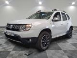 a picture of a white dacia parked in a garage
