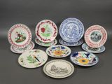 six plates with different designs and designs on them on a table
