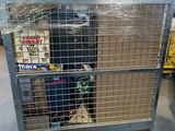 a cart with a bunch of boxes on it in a warehouse