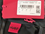a close up of a tag on the back of a jacket