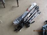 a lot of tripods that are sitting on the floor