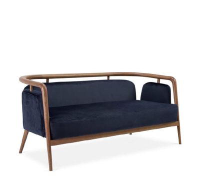 une photo d'un canapé bleu sur lequel repose une structure en bois