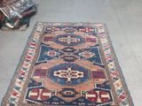 a rug on the floor in the middle of the room