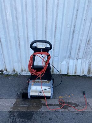 a machine that is sitting on the side of the street