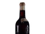 a bottle of wine that is sitting on a table