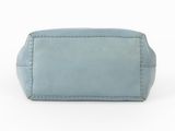the small leather pouch is light blue and has a zippered closure