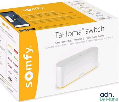 a box with a white and yellow device inside of it