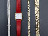 trois types de montres différents sur un fond noir