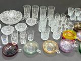 a lot of glass items that are on the table
