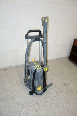 an image of a vacuum cleaner in a garage
