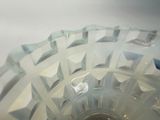 a glass vase that has a lot of glass in it