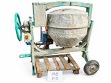 concrete mixer on a pallet with a price tag on it