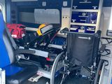 a wheelchair sitting in the back of a van
