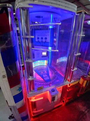 une image représentant un wagon de queue illuminé de lumières bleues et rouges