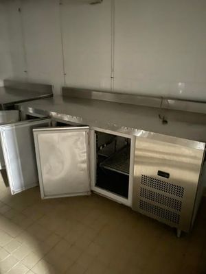 an image of a kitchen with stainless steel appliances