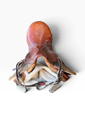 an octopus that is sitting on top of a pile of clothes