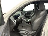 a picture of a car interior with the door open