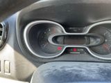 a close up of a car dashboard with a speedometer