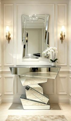 une table en verre sur laquelle est posé un miroir, dans une pièce