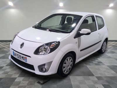 a picture of a small white car on a checkered floor