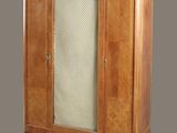 an image of a cabinet with a marble top and a glass door