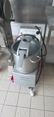 an image of a kitchen with a mixer on the floor