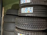 several tires stacked on top of each other on a shelf