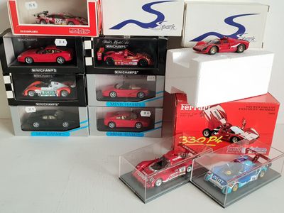 a lot of toy cars that are sitting on a table