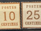 deux timbres portant respectivement les mentions « vingt cents » et « vingt cents »