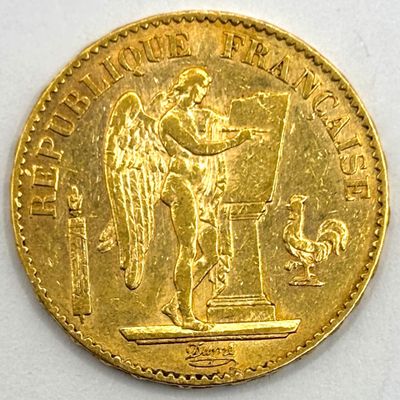 une image représentant une pièce d'or sur laquelle figure un ange