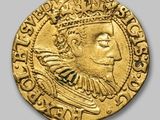 an image of a gold coin with a woman ' s face on it