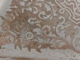 a silver tray with a floral design on it