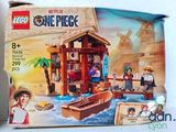 a box of legos with a pirate ship inside of it