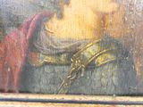 un tableau représentant une femme avec une chaîne autour du cou