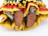 two pairs of shoes sitting on top of each other