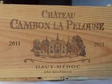 a wooden box that has a wine label on it